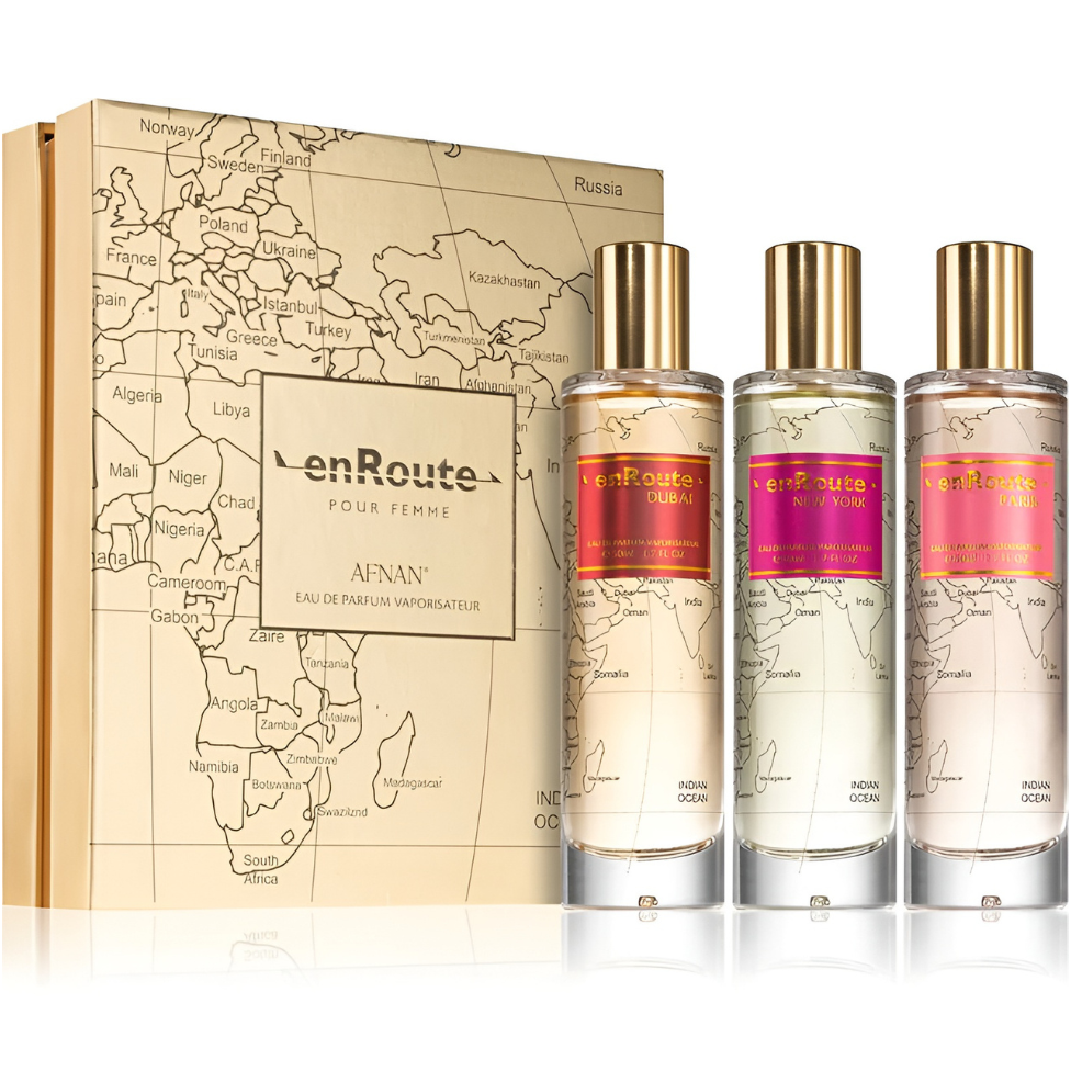 enRoute perfume set with three bottles and a decorative box on a white background