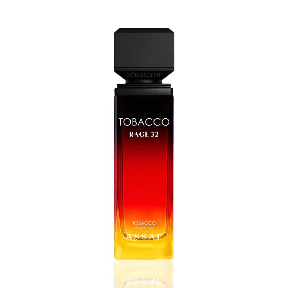 Assaf Tobacco Rage 32 cologne bottle with a black cap and a gradient glass body transitioning from black at the top to red and yellow at the bottom, on a white background with a reflection.