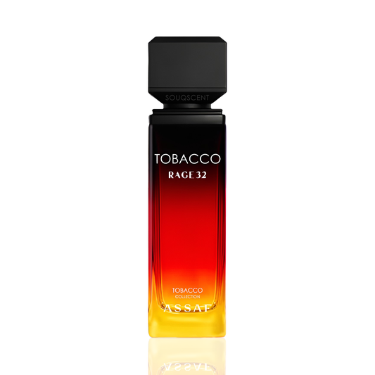 Assaf Tobacco Rage 32 cologne bottle with a black cap and a gradient glass body transitioning from black at the top to red and yellow at the bottom, on a white background with a reflection.