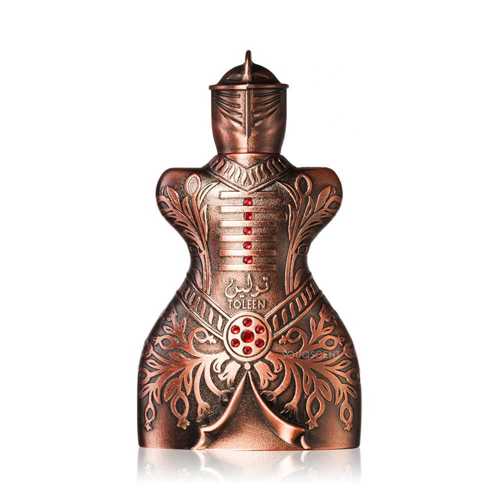 Decorative copper bottle with intricate designs on a white background
