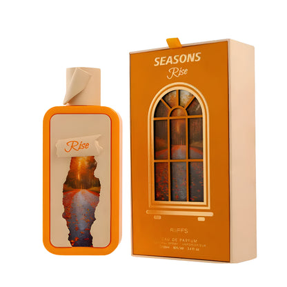 Orange perfume bottle and packaging with 'SEASONS Rise' text on a white background