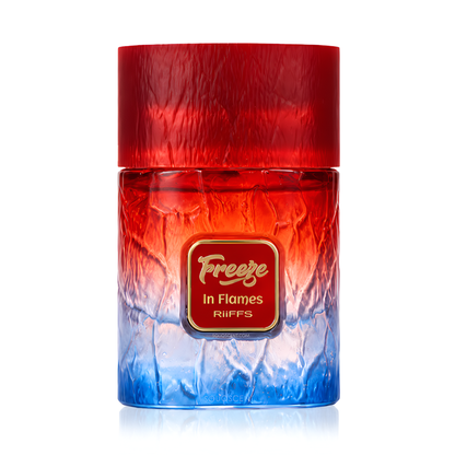 A bottle of RIIFFS Freeze In Flames fragrance with a textured red-to-blue gradient design, featuring a red cap and a central gold-bordered label.
